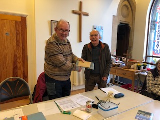 Keith Wadd at 90 stepping down from Harrogate Ramblers Committee after 50 years being presented by Chairman Andrew Willoughby Nov 25y